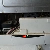 ¿Donde se coloca el receptor de termostato inalamrico Saunier Duval Exacontrol E7RC en la caldera Saunier Duval Thema F24 Nox?